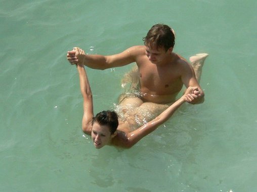 Amateur Woman Fucked Doggystyle in Water Photo