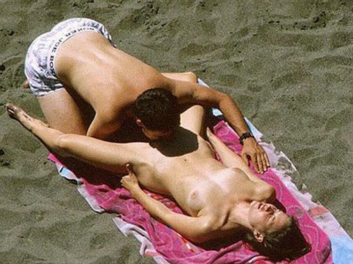 Wife Gets Her Pussy Eaten on Private Beach Photo