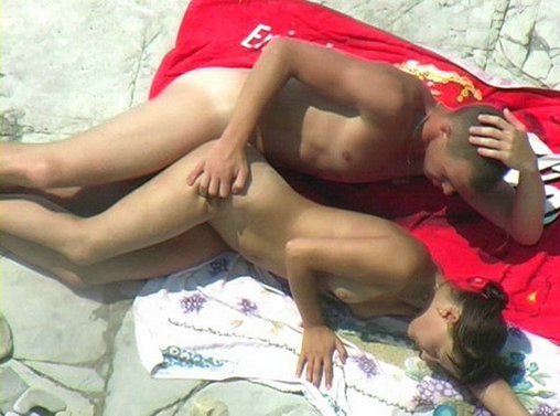 Young Amateur Couple Fucking on Beach Photo
