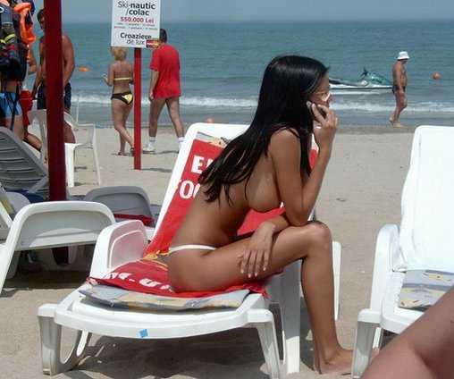 Sexy Romanian Woman Exposes Big Breasts on Beach Photos